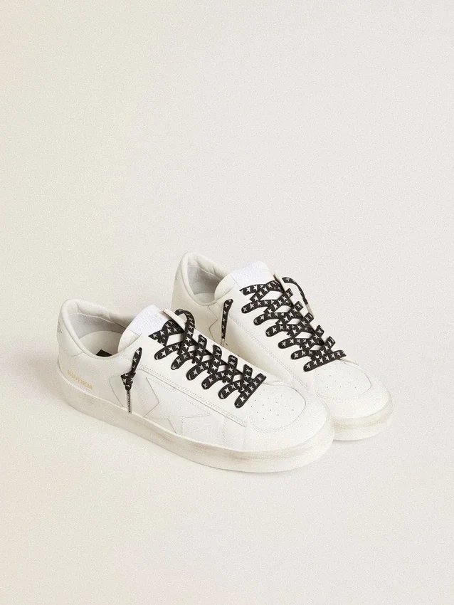 Cordones de algodón negros con estrellas plateadas en contraste