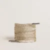 Cordones de lurex dorados con logotipo blanco en contraste