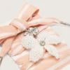 Cordones «Pieles» a rayas blancas y rosas con dijes de cuentas y cristales