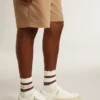 Cárdigan blanco de algodón para hombre con diseño de trenzado y ribetes azules