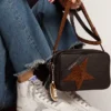 Francy de mujer en piel con estrella de ante