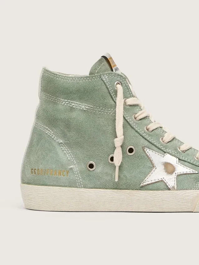 Francy en ante verde con estrella de piel metalizada plateada
