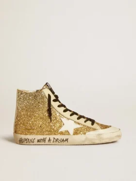 Francy Penstar en purpurina dorada con estrella de piel blanca