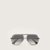 Gafas de sol estilo aviador con montura de color metal y lentes grises