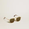 Gafas de sol estilo aviador con montura dorada y lentes verdes