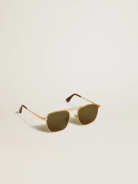 Gafas de sol estilo aviador con montura dorada y lentes verdes