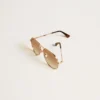Gafas de sol estilo aviador con montura en oro rosa y lentes color miel