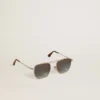 Gafas de sol estilo aviador con montura plateada y lentes azules
