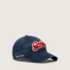 Gorra de béisbol azul vaquero con parche «Golden» de rizo rojo y blanco