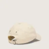 Gorra de béisbol de color crudo con una estrella bordada tono sobre tono