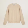 Jersey beige de mujer con la inscripción «Golden» en la espalda