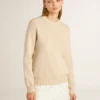 Jersey beige de mujer con la inscripción «Golden» en la espalda