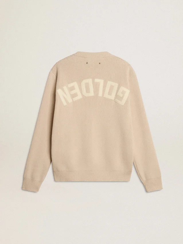 Jersey beige de mujer con la inscripción «Golden» en la espalda