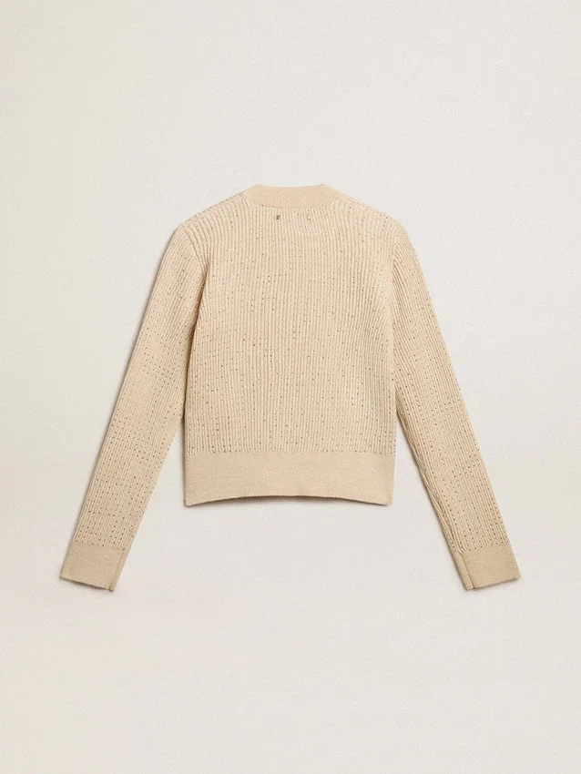 Jersey corto de cuello redondo en lana beige con cristales por toda la prenda