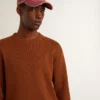 Jersey de cuello redondo para hombre con logotipo en la espalda