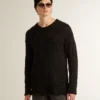 Jersey de lana negro para hombre con efecto desgastado