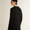 Jersey de lana negro para hombre con efecto desgastado