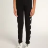Leggings negros para niñas con estrellas blancas en los laterales
