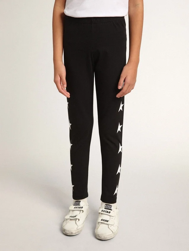 Leggings negros para niñas con estrellas blancas en los laterales