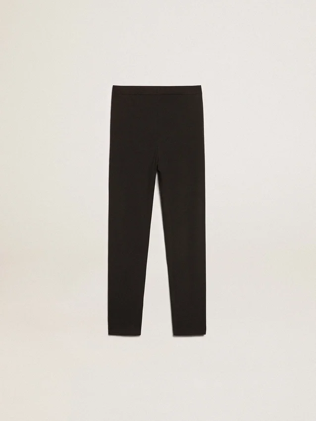 Leggings negros para niñas con estrellas blancas en los laterales