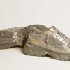 Lightstar para hombre en piel metalizada y malla plateada con estrella gris