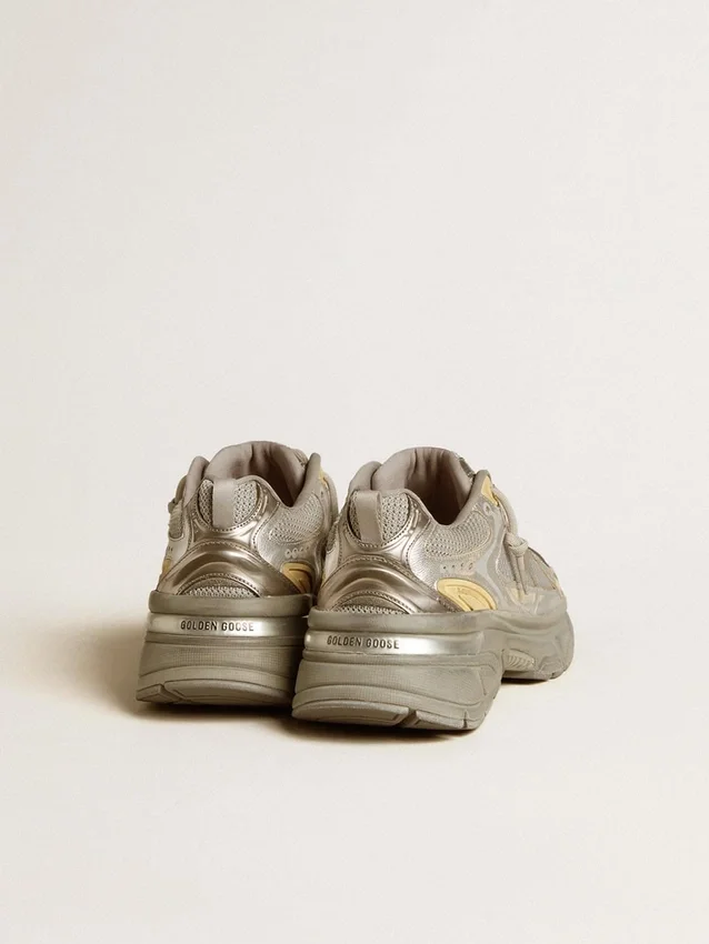 Lightstar para hombre en piel metalizada y malla plateada con estrella gris