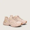 Lightstar para mujer con parte superior de piel rosa y malla y estrella rosa