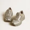 Lightstar para mujer en piel metalizada y malla plateada con estrella gris