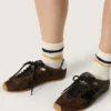 Marathon Speed para mujer en piel con estampado de serpiente marrón, estrella negra y lengüeta de talón de piel plateada
