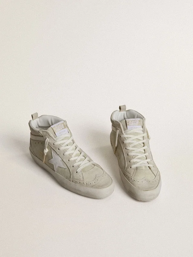 Mid Star en ante gris claro con estrella de piel blanca