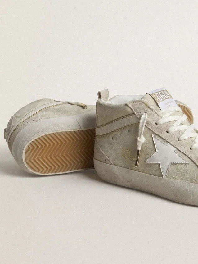 Mid Star en ante gris claro con estrella de piel blanca