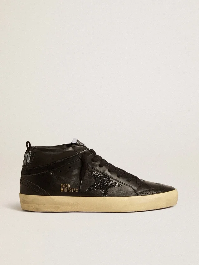 Mid Star para mujer en napa negra con estrella negra brillante y detalle en ante