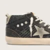Mid Star para mujer en negro brillante con estrella y lengüeta del talón de ante gris paloma
