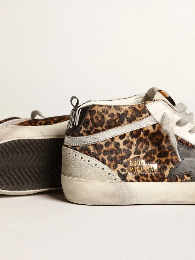 Mid Star para mujer en piel de potro con estampado de leopardo y estrella negra