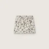 Minifalda para niñas «Journey» de lona de algodón blanca con estampado floral verde