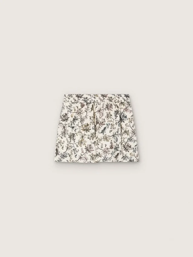Minifalda para niñas «Journey» de lona de algodón blanca con estampado floral verde
