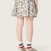 Minifalda para niñas «Journey» de lona de algodón blanca con estampado floral verde