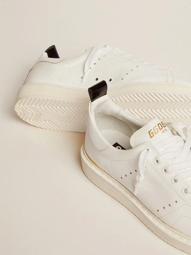 Modelo «Starter» para hombre en piel con estrella en la lengüeta del talón