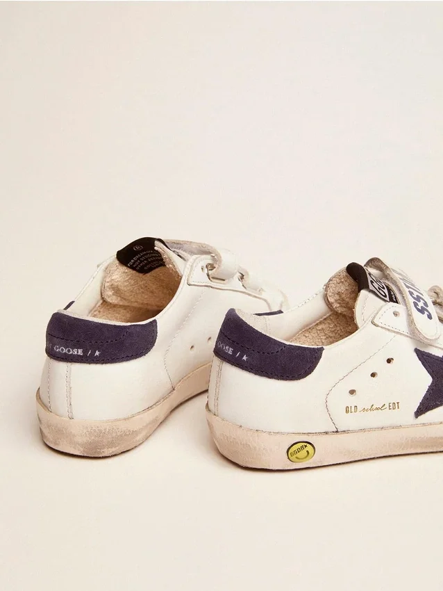 Old School Young en piel blanca con estrella de ante azul y lengüeta en el talón