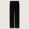 Pantalones acampanados de corte entallado para mujer en terciopelo de algodón negro