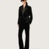 Pantalones acampanados de corte entallado para mujer en terciopelo de algodón negro