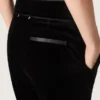 Pantalones acampanados de corte entallado para mujer en terciopelo de algodón negro