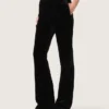 Pantalones acampanados de corte entallado para mujer en terciopelo de algodón negro