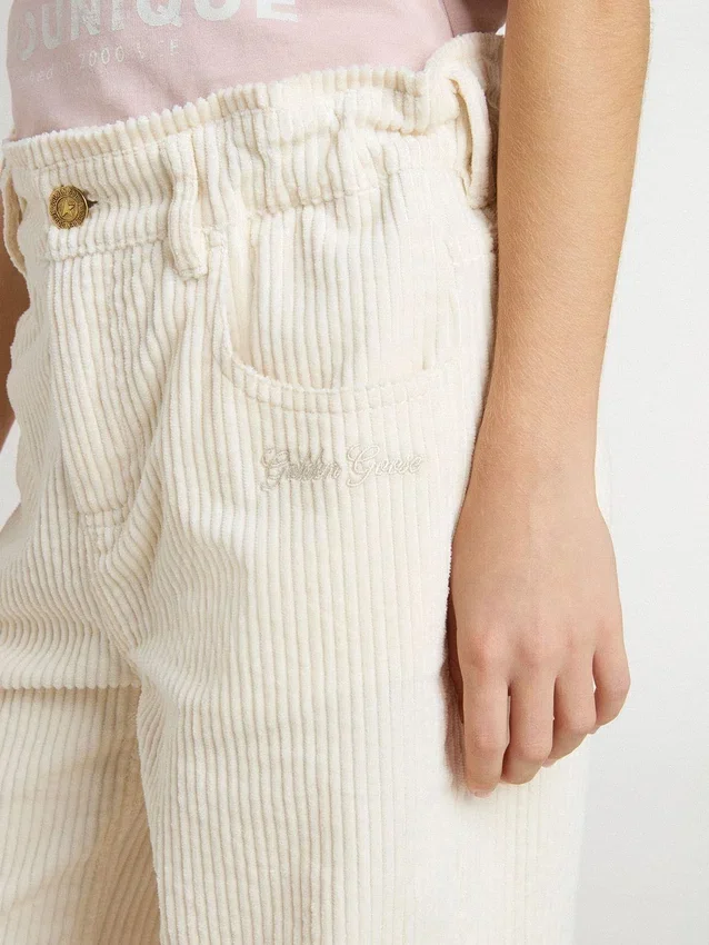 Pantalones anchos de canalé color crema con bordados para niñas