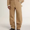 Pantalones beige de hombre con parches