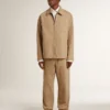 Pantalones beige de hombre con parches