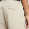 Pantalones chinos beige para niño con toques multicolores