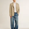 Pantalones chinos de denim para hombre con detalles desgastados