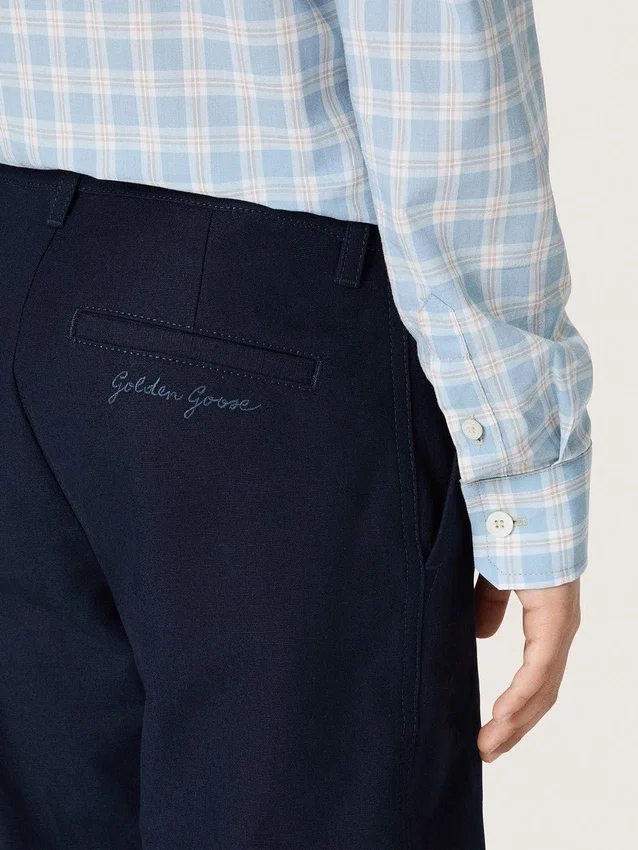Pantalones chinos unisex «Journey» de lona de algodón azul con logotipo bordado