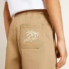 Pantalones cortos de algodón beige para niños
